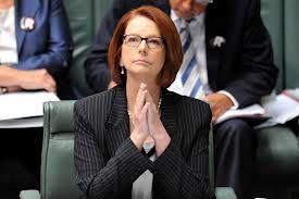 PM Julia Gillard. Thinking, not praying.